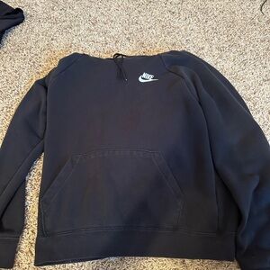 A black nike sweatshirt size xs